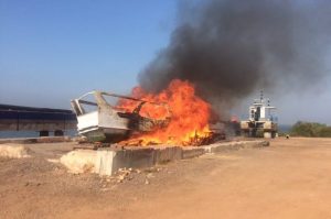 The apprehended Indonesian fishing vessel in flames at the secure facility in Darwin. Image: AFMA - @ Fiskerforum