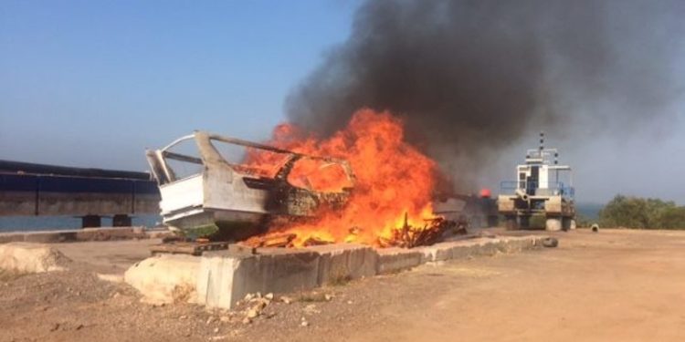 The apprehended Indonesian fishing vessel in flames at the secure facility in Darwin. Image: AFMA - @ Fiskerforum