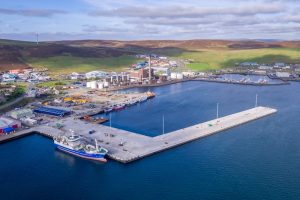 Completion of a new fishmarket at Mair’s Quay will transform the Holmsgarth area into a new fishing hub at Lerwick Harbour. The market location is centre left beyond the dock. Image: Simon Thompson