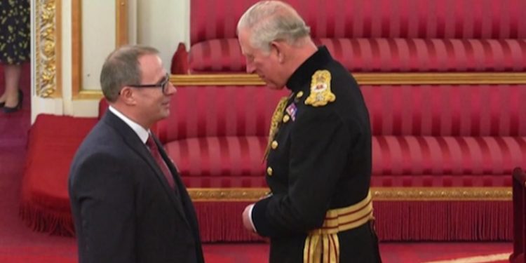 Mike Park received his OBE from Prince Charles. Image: SWFPA - @ Fiskerforum