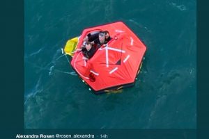 Cruise passengers tweeted images of some of Sonja’s crew being rescued from a liferaft. Image: Twitter - @ Fiskerforum
