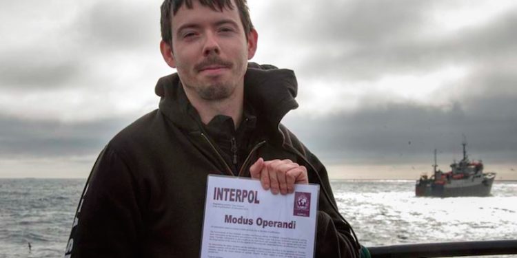 Peter Hammarstedt holding the Interpol Notice issued against one of the IUU fishing vessels - @ Fiskerforum